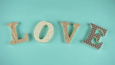 Craft Letters forms a word LOVE. Stop-motion animation Video stock 103533875