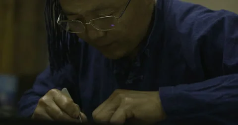 Craft man, close up wearing cap Stock Footage 141356853