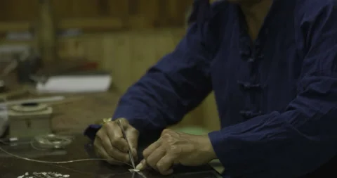 Craft master looking at detail Stock Footage 141357620