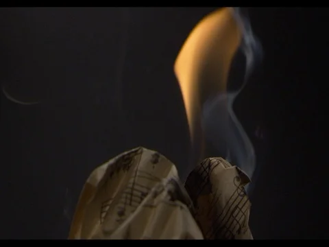 Craft music paper burning, super close-up, slow mo, Burning fire Stock Footage 74284650
