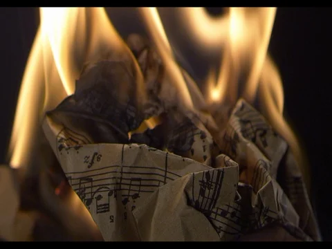 Craft music paper burning, super close-up, slow mo, Burning fire phase 2 Stock Footage 74285534