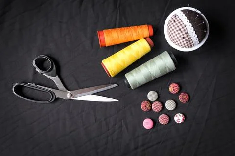 Craft, needlework concept, tools closeup on black background.  Stock Photos