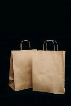 Craft packages on a black background Stock Photos