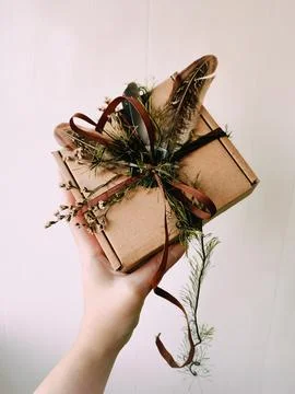 Craft packaging, package, box, parcel. Decorated brown paper box Foto stock