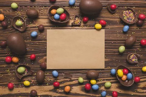 Craft paper amidst easter sweets Stock Photos
