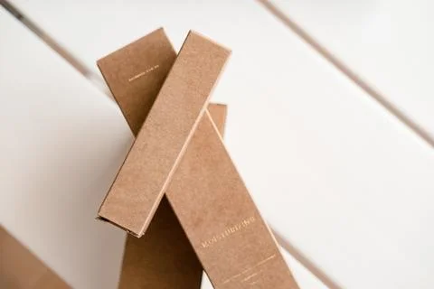 Craft paper cosmetic boxes, packaging mockup Stock Photos