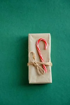 Craft paper envelopes tied with string and decorated with Christmas candy Stock-Fotos