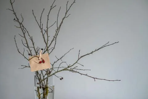 Craft paper handmade Envelope hangs on a tree branch at home Stock Photos