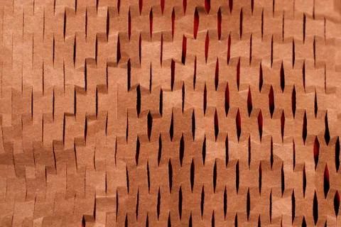 The craft paper pattern was shot close-up on a red background Stock Photos