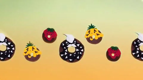 A craft pattern of donuts cut out of colored paper on a green-orange background Stock Illustration