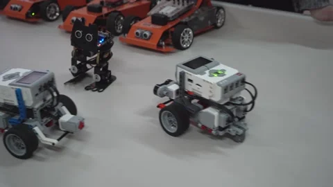 Craft for robotics class. Robot car made from LEGO construction kits and motors Stock Footage 259572951
