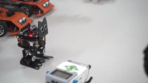 Craft for robotics class. Robot car made from LEGO construction kits and motors Stock Footage 260131641