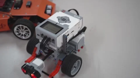Craft for robotics class. Robot car made from LEGO construction kits and motors Stock Footage 260633999