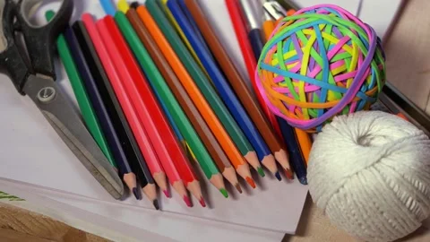 Craft supplies for art projects on a table Stock Footage 163827148