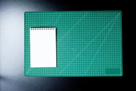 Craft table with clipboard, note sticker pen, pencil, paper scissors and card Stock Photos