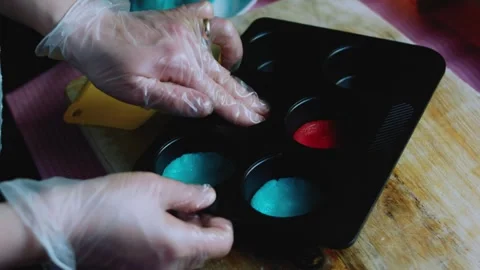 Crafted food sequence of placing the colored cookie tray into the oven Stock Footage 342155157