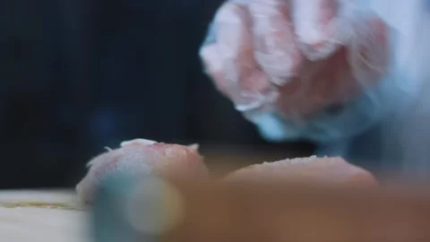 Crafted recipe process: slicing chicken breast into even pieces Vídeo Stock 342180426