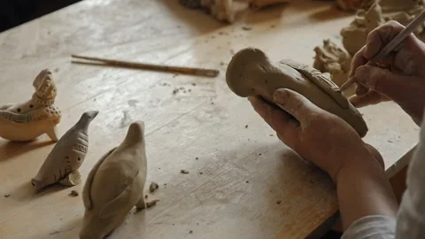 Crafting a clay whistle Video stock 218604293