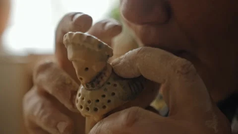 Crafting a clay whistle Video stock 218604639