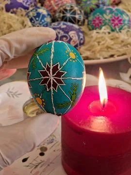Crafting Easter egg using traditional Ukrainian pysanka technique with bees.. Stock Photos