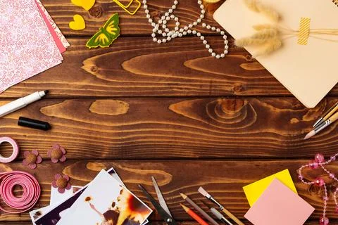 Crafting fun at a creative workspace with colorful materials on a wooden table Stock Photos