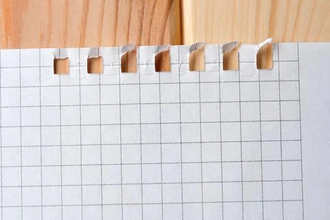 Crafting ideas on a fresh, grid-patterned notepad at a cozy workspace Stock Photos