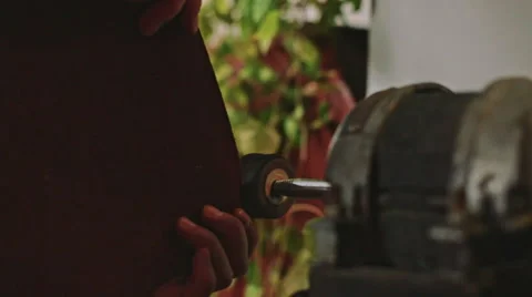 Crafting leather on a vintage machine Stock Footage 61034083