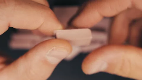 Crafting Miniature Red Bricks: A Close-Up Showcase Stock Footage 251192485