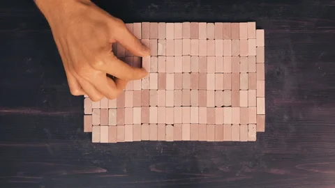 Crafting Miniature Red Bricks: A Close-Up Showcase Stock Footage 261389802