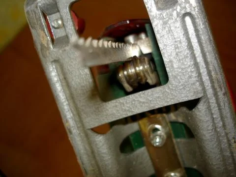 Crafting Precision With an Electric Jigsaw Showcasing a Sharp Saw Blade Stock Photos