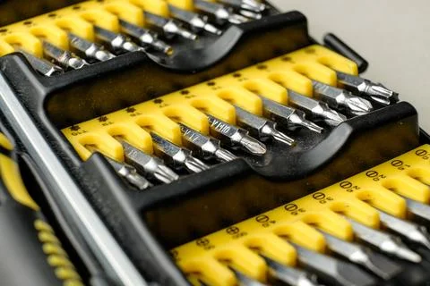 Crafting precision with a vibrant toolkit of screwdriver bits and organizers Photos