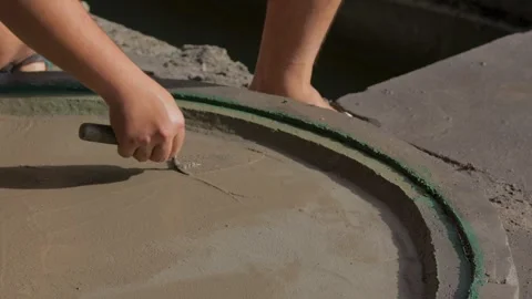 Crafting a smooth surface with hand tools at a construction site Video stock 312242696