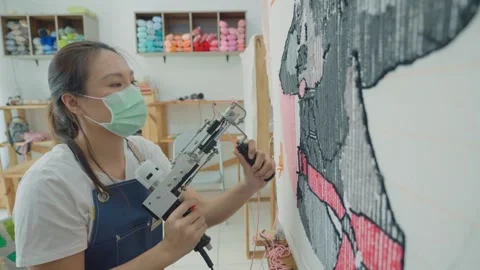 Crafting a Textile Art Piece with Precision Tools 動画素材 333448224