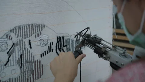 Crafting Textiles: A Glimpse into Hand-Stitched Artistry Stock Footage 327577983