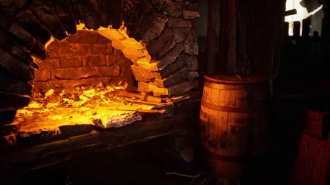 Crafting tools at an old forge with glowing flames and rustic surroundings Stock Footage 326196081