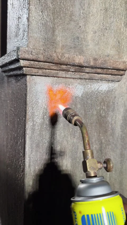 Crafting Unique Textures on Stone Column with Blowtorch Technique Stock Footage 324955287