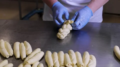 Crafting Walnut-Filled Braids in a Bakery Stock Footage 285127529