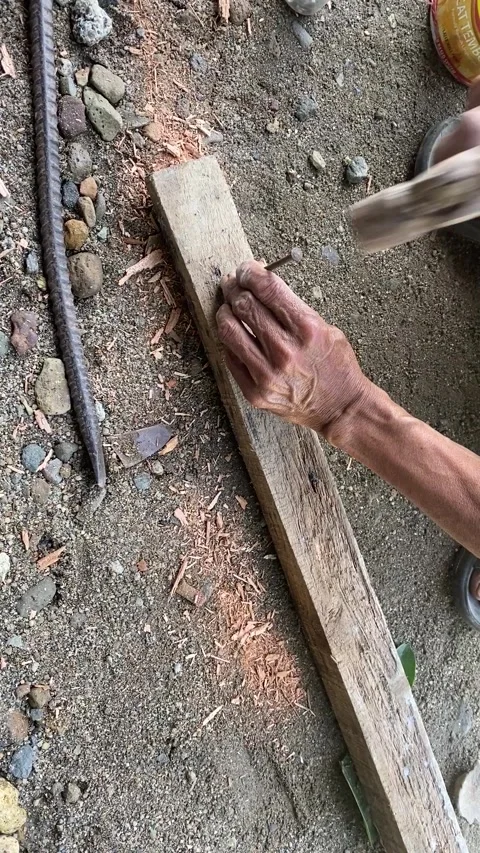 A craftman is hammering Stock Footage 304100220