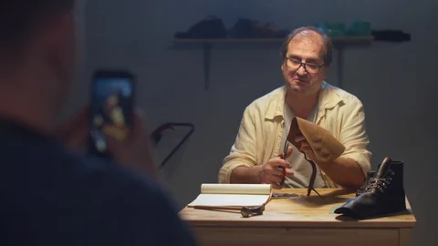 Craftsman and student make tutorial video. Stay home Stock Footage 127831165