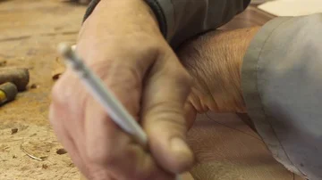 Craftsman artisan making mold to make guitar slow motion Stock Footage 85487552