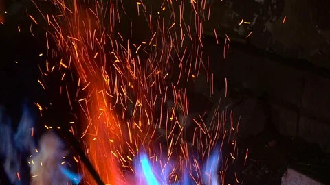 Craftsman Blending the Fire with a Stick 4 K Video Видео 103342233