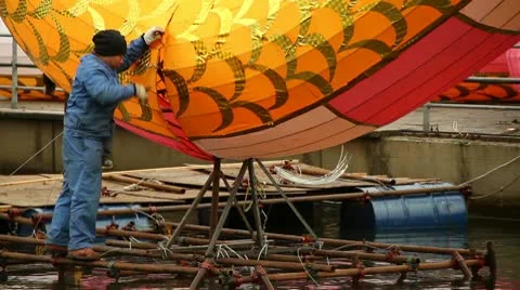 Craftsman Building A Big Dragon Lantern Stock Footage 10594477