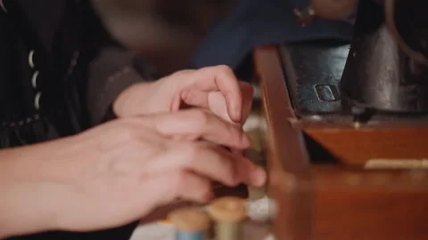 Craftsman coating spool with wax. Close examination of craftsman meticulously Stock Footage 346549952