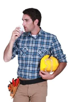 Craftsman drinking coffee Stock Photos