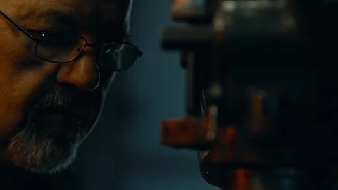 A Craftsman focused on machine Stock Footage 275444456