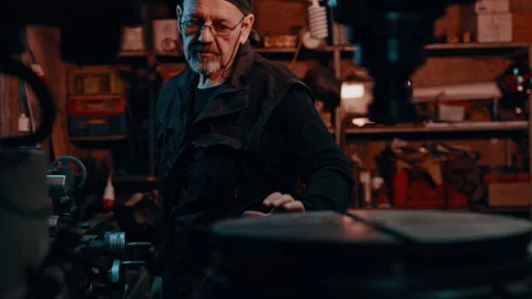 A Craftsman looking at machine Stock Footage 275445928
