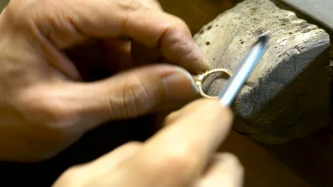 Craftsman making diamond ring. Diamond ring jewelery product close up Stock Footage 139665658