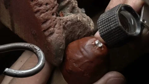 Craftsman making diamond ring. hand made jewelery. Putting emerald diamond gem. Stock Footage 139713473