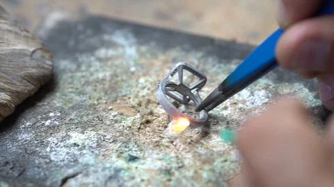 Craftsman making diamond ring. welding gold. Diamond ring jewelery product. Stock Footage 118721225