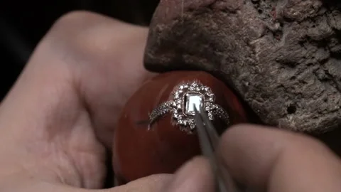 Craftsman making jewelery in his workshop. hand made diamond jewelery. Stock Footage 139727211
